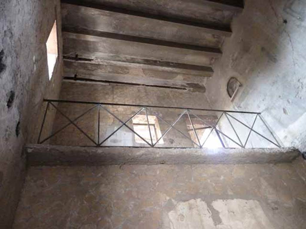 III.11 Herculaneum. May 2010. Room 3, looking south to upper floor.